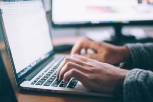 man working on laptop